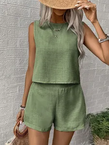 Detailed view of the textured linen sleeveless top and shorts set in olive green