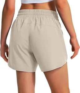 Detail shot of the back of women's beige 5-inch quick-dry lightweight running shorts