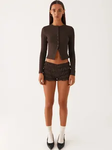 Detail view of a slim-fit dark brown ribbed button cardigan featuring long sleeves