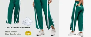 Detailed view of green Y2K track pants with white side stripes and split hem for women