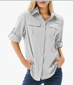 Close-up of women's quick-dry stretch hiking shirt featuring multiple functional pockets