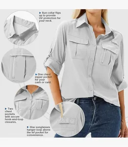 Close-up of light gray quick-dry outdoor shirt with functional multi-pocket details.