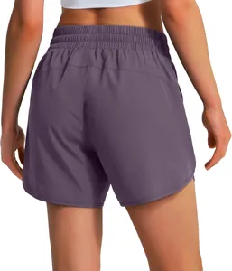 Back view detail of 5-inch purple women's athletic running shorts with wide elastic waistband.