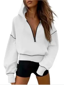 Stylish women's white half-zip cropped hoodie with contrast black stitching detail.