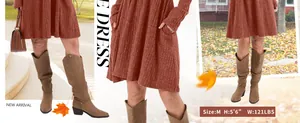 Rust ribbed long sleeve dress with pockets worn with tall brown boots