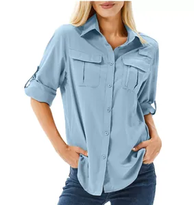 Detail view of light blue women's quick-dry outdoor shirt with functional cargo pockets