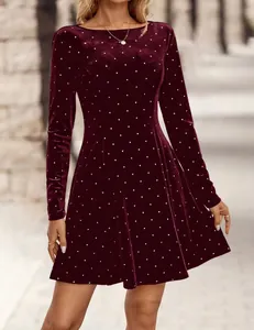 Detail showing the burgundy velvet texture and sparkling silver rhinestones on the mini dress.