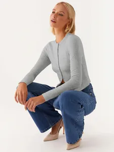 Professional studio shot of a slim fit grey ribbed button-up cardigan for women