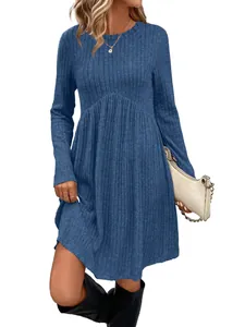 Detailed view of bohemian long sleeve ribbed knit dress with round neck in solid blue.