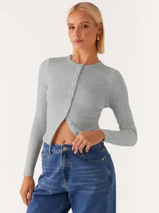 Detailed view of women's slim fit grey ribbed cardigan with elegant button front design