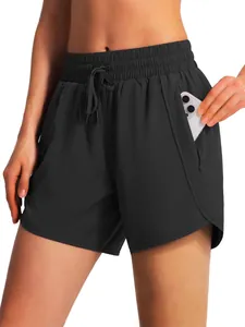 Professional black quick-dry women's running shorts with 5-inch inseam and zipper pockets