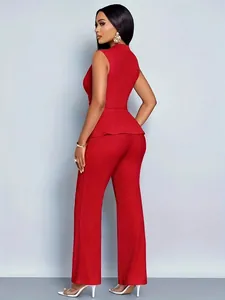 Elegant red two-piece set featuring a sleeveless peplum top and ribbed wide-leg pants.