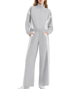 Chándal gris de dos piezas para mujer con chaqueta con cremallera y pantalón ancho