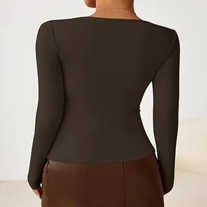 Back view of a slim-fit dark brown long-sleeved top showing the tight fit and smooth fabric.