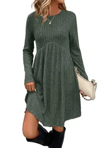 Detailed view of women's ribbed long sleeve round neck solid color mini dress in dark green