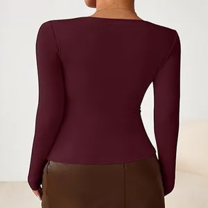 Detailed back view of a slim fit burgundy long sleeve T-shirt for women in autumn