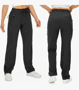 Detaillierte Vorder- und Rückansicht der schwarzen schnelltrocknenden Damen-Wanderhose mit Kordelzug