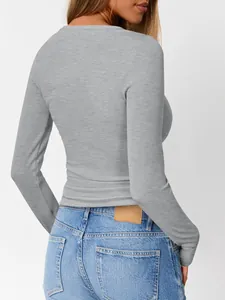 Detailed back view of a slim fit gray ribbed long-sleeve knit top for women fashion