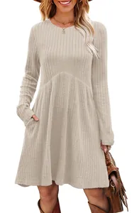 Bohemian ribbed long sleeve crew neck dress in beige with side pockets full view