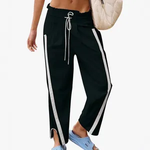 Women's high waist casual sweatpants with white side stripes and drawstring in Y2K style