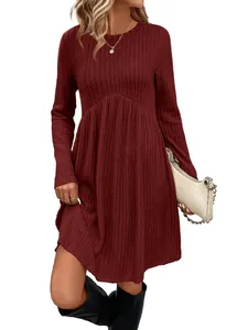 Detailed view of women's wine red ribbed long sleeve crew neck dress with a bohemian hemline