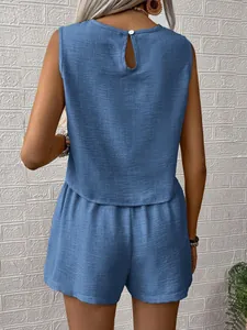 Back view of women's blue sleeveless top and shorts set featuring premium linen texture