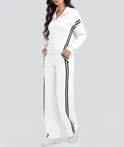 Chándal de dos piezas blanco para mujer con rayas negras, chaqueta con cremallera y pernera ancha