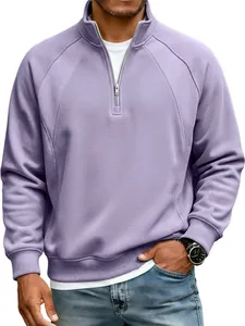 Close-up detail of men's lavender half-zip raglan sleeve sweatshirt with stand collar