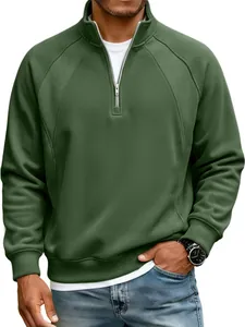 Detail of men's olive green half-zip sweatshirt with raglan sleeves and stand collar.