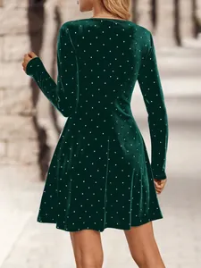 Vintage dark green velvet mini dress with silver polka dot rhinestones and slim fit.