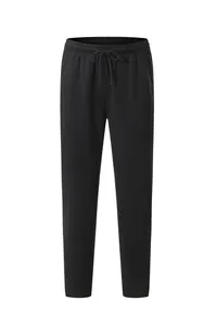 Detailed front view of high-quality black solid color sports sweatpants for fitness training
