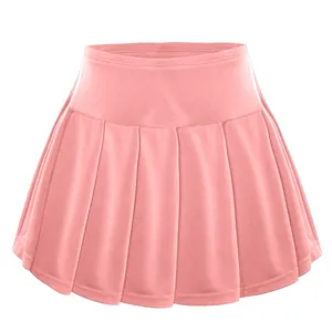 Close-up view of pink pleated tennis skort for girls showing soft fabric texture