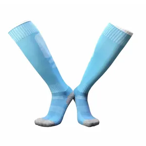 High-performance sky blue athletic soccer socks featuring reinforced grey heel and toe