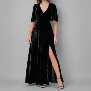 Elegant black velvet V-neck evening gown with a high slit and stylish half sleeves.
