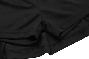 Close-up detail of the durable stitching on inner shorts of black tennis skort