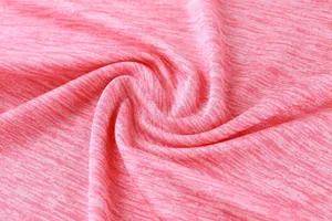 Macro detail of pink heathered quick-dry elastic fabric used for sports apparel