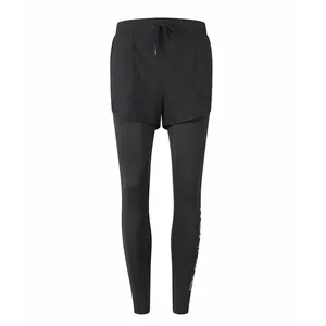 Close-up view of the 2-in-1 layered design on black women's sports leggings