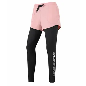 Close-up detail of women's 2-in-1 sports leggings featuring vertical RUNNING print on the leg