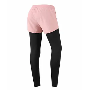 Rear view of women's 2-in-1 quick-dry sports leggings with pink shorts and black tights