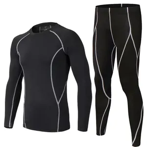 Detail of black compression set featuring long sleeve top and leggings with contrast stitching