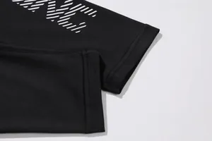 Detail close-up of high-quality stitching and breathable fabric on black yoga pants