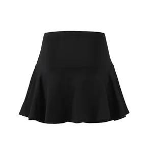 Frontal view of high-waist black pleated athletic tennis skort with inner shorts