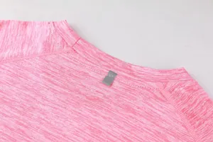 Close-up detail of the round neckline and pink marled fabric of a sports T-shirt