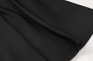 Close-up detail of high-performance quick-dry black breathable fabric for athletic skorts