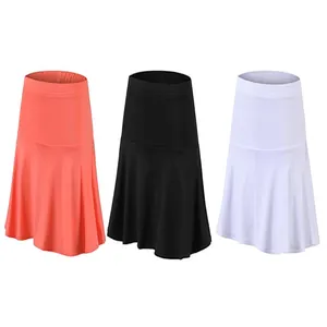 Set of women's sports tennis skorts in coral, black, and white, quick-dry pleated fabric.