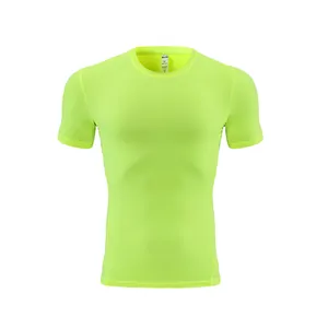 Detail view of neon yellow athletic compression t-shirt for gym and running