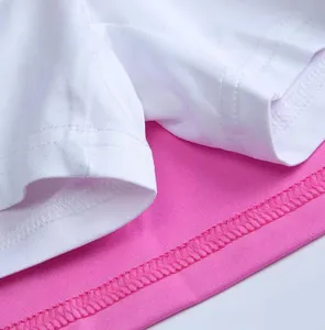 Detail view of the stitching on a white and pink double-layered quick-dry sports skort for girls