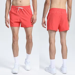 Close-up detail view of unisex red quick-dry running shorts for athletic training