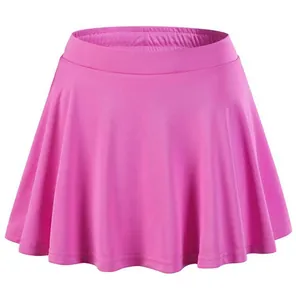Close-up front view of a vibrant pink quick-drying sports skort for girls' activewear