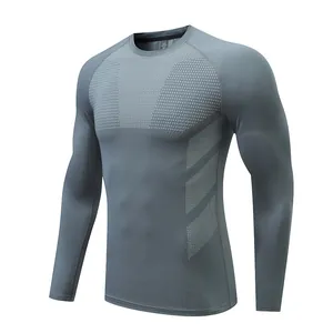 Close-up of a grey long-sleeve quick-dry compression sports shirt for men and kids